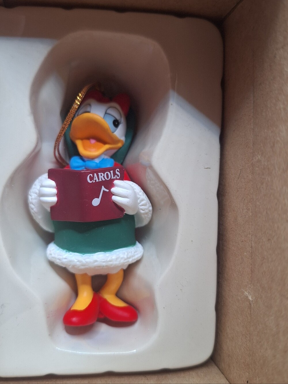 Disney Grolier Christmas Magic Ornament featuring Daisy Duck Caroling